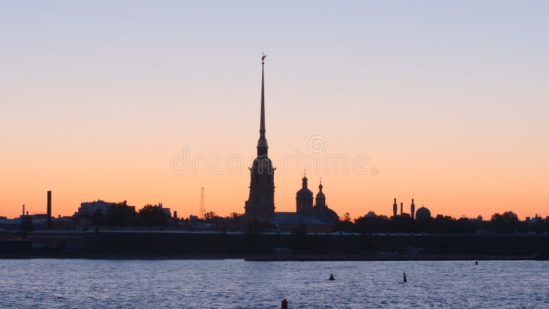 Silhouette of Peter and Paul Fortress in the sunset sky - St. Petersburg, Russia