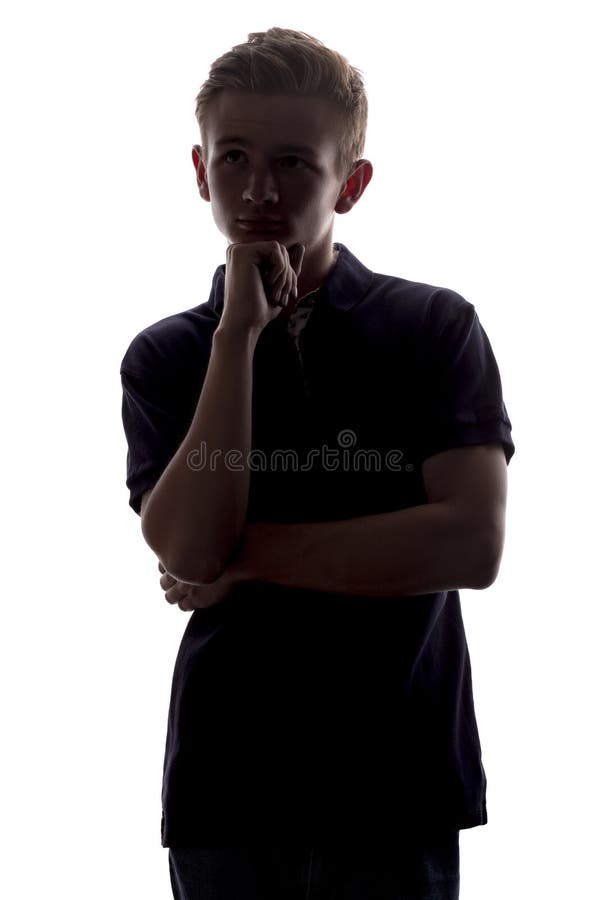 Silhouette of a guy man thoughtfully looking upwards on a white isolated background royalty free stock photography Silhouette of a guy man thoughtfully looking upwards on a white isolated background royalty free stock photography