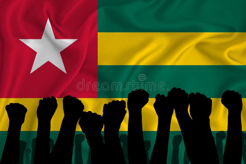 Silhouette of raised arms and clenched fists on the background of the flag of togo. The concept of power,  conflict. With place stock illustration