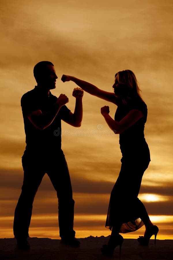 Silhouette ready to fight stock photos