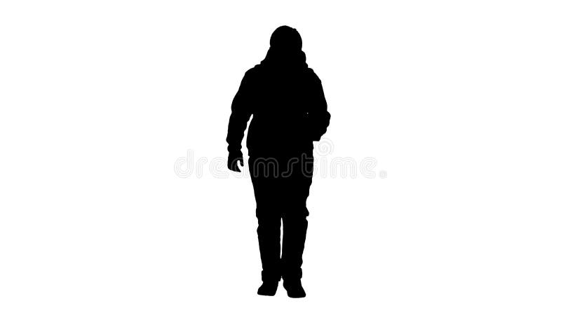 Silhouette Schoolboy with backpack wearing medical mask walking.