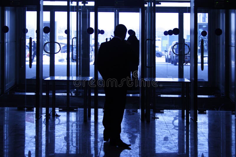 Silhouette of the security guard stock photography
