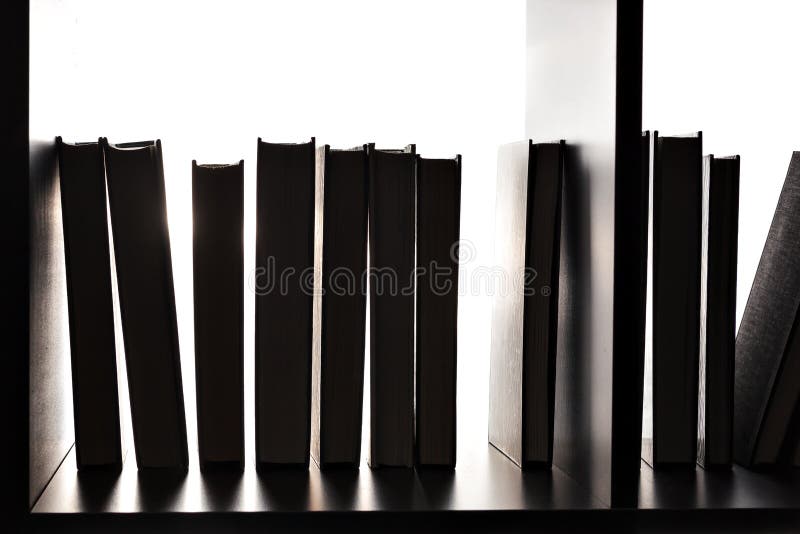 Silhouette of Several Books on the Bookshelf Stock Photo Image of