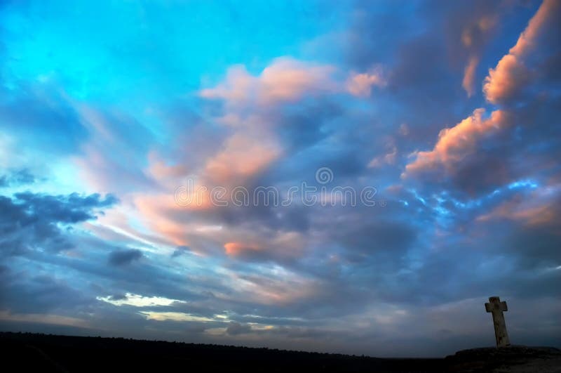 Silhouette of stone cross