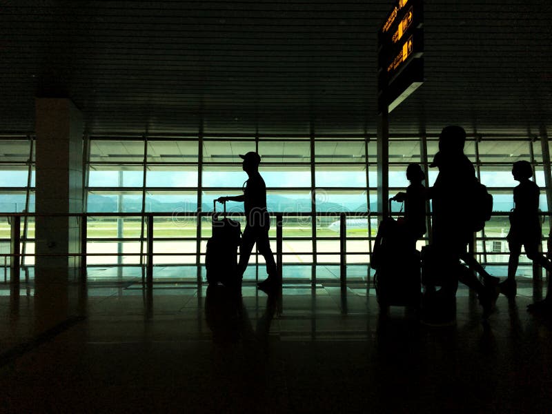 Silhouette, trip Summer flight on the gate in airport Background royalty free stock image Silhouette, trip Summer flight on the gate in airport Background royalty free stock image