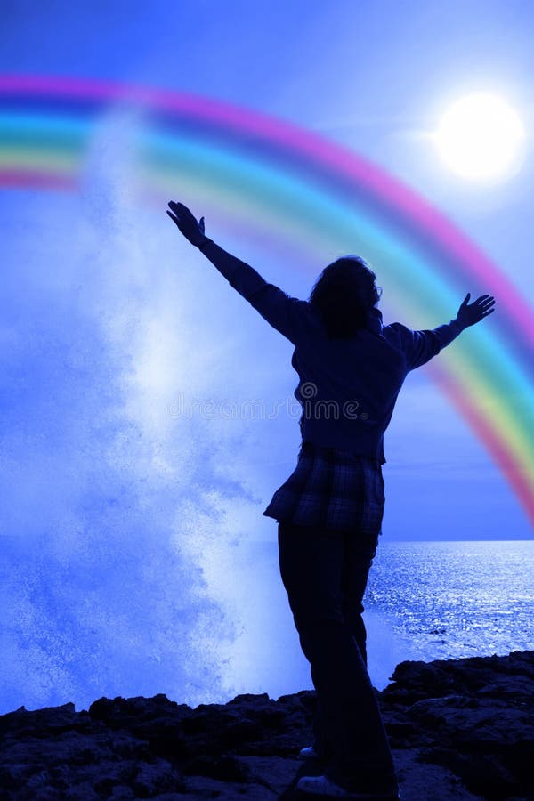 Silhouette of woman with outstretched arms