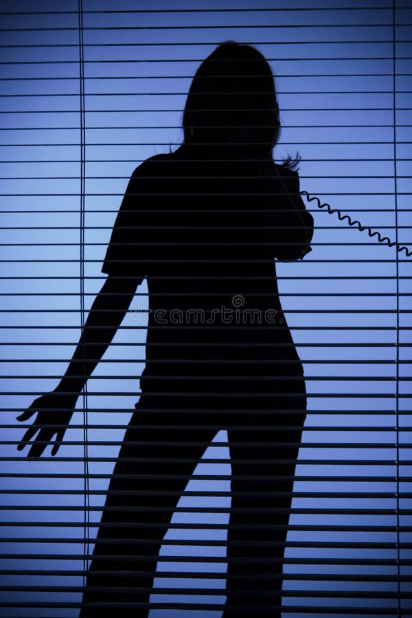 Silhouette of woman on the phone (blind)