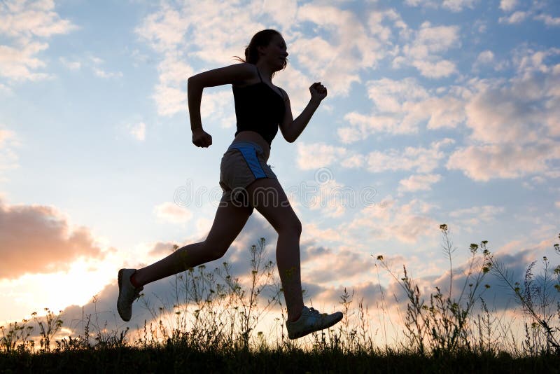 Silhouette woman run