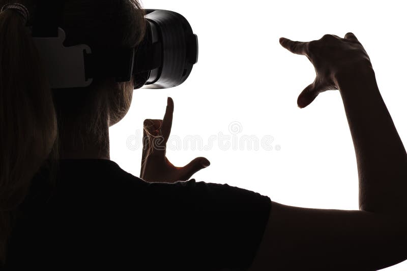 Silhouette of a woman in spectacles of virtual reality royalty free stock image