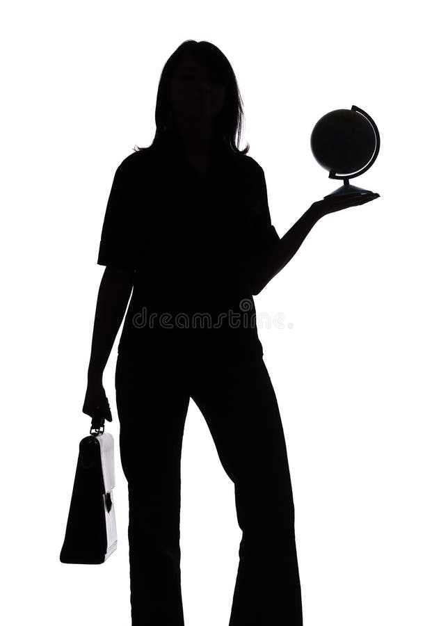 Silhouette of woman with suitcase and globe