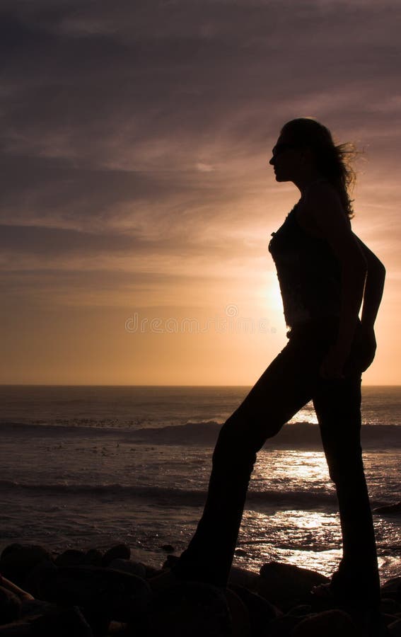 Silhouette of a woman at sunse