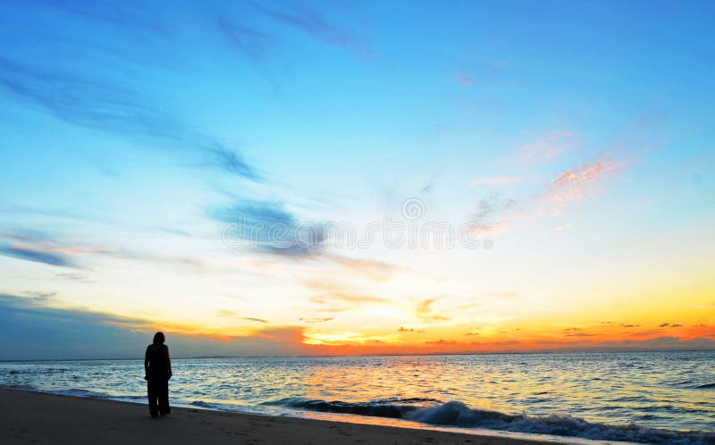 Silhouette woman,sunset on ocean Amity Point beach, North Stradbroke Island,Australia stock image Silhouette woman,sunset on ocean Amity Point beach, North Stradbroke Island,Australia stock image