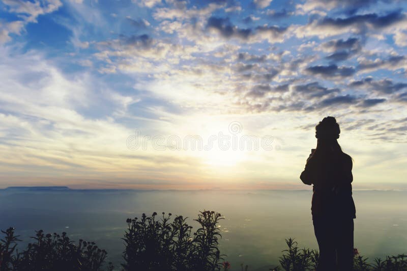 Silhouette women traveller standing to see the highland mountains royalty free stock photography Silhouette women traveller standing to see the highland mountains royalty free stock photography