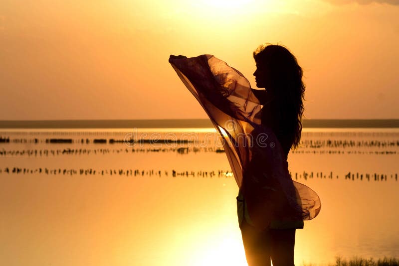 Silhouette Of A Young Elegant Woman In A Dress Tilted His Head To The Bud  Of Rose, Figure Of Slim Beautiful Girl With A Flower On Stock Image - Image  of pretty,