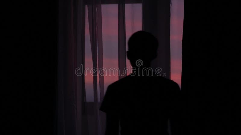 Silhouette of Man Banging on Window From, Stock Video