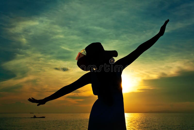 Silhouette of young pretty woman