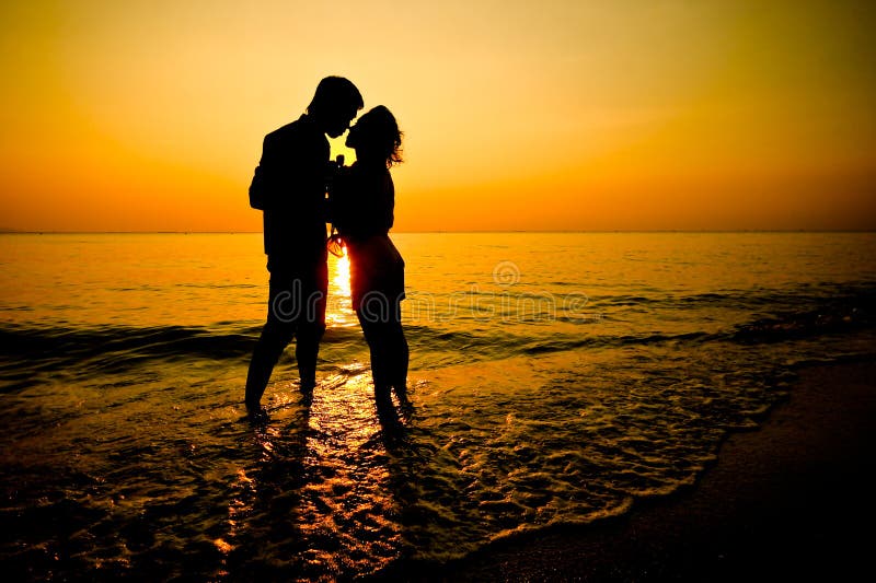 Silhouette of a Young Romantic Couple on Sunset Stock Image - Image of  happiness, nature: 17935875