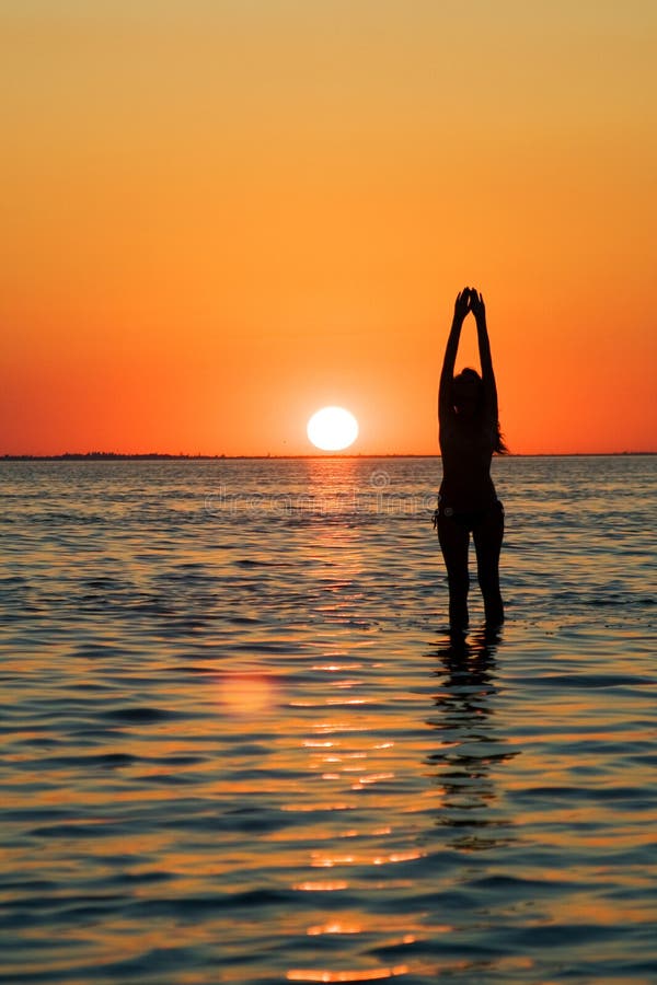 Silhouette of the young woman