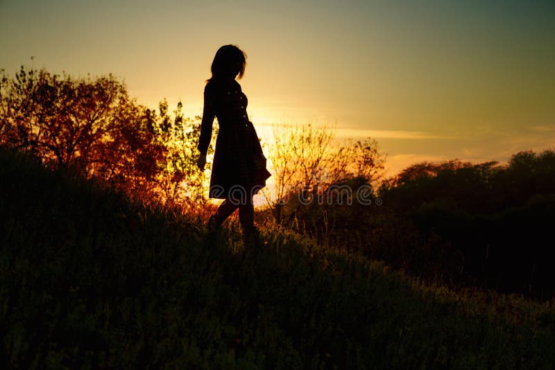 girl in field sunset