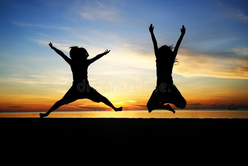 Silhouette young woman jumping