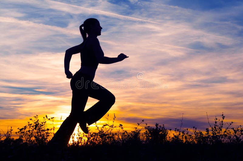 Silhouette of young woman running in nature royalty free stock images Silhouette of young woman running in nature royalty free stock images