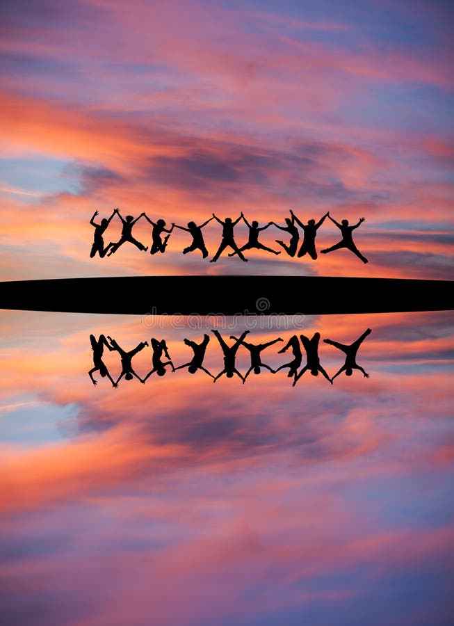 Silhouetted teens holding hands and jumping in sunset sky stock photos Silhouetted teens holding hands and jumping in sunset sky stock photos