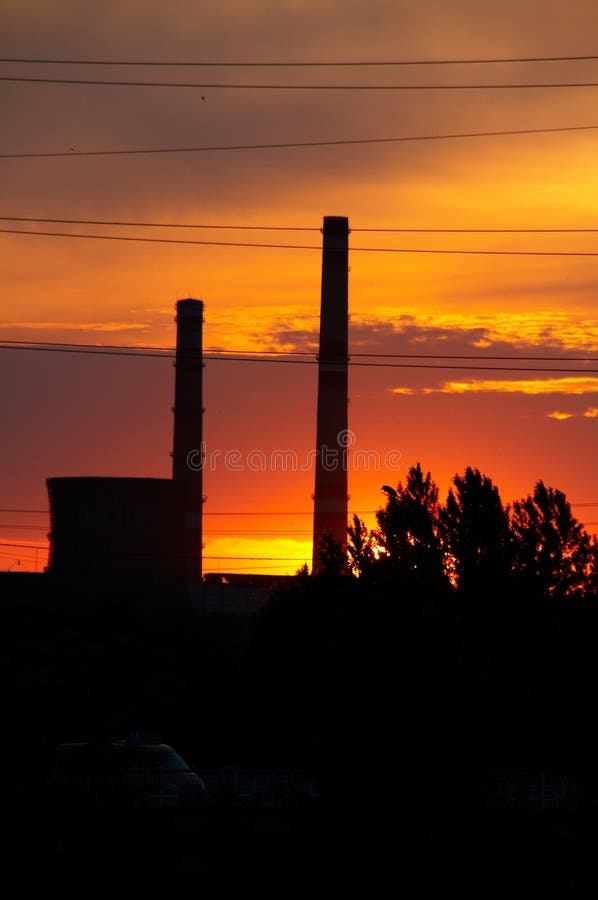Silhouettes of factory pipes royalty free stock photo Silhouettes of factory pipes royalty free stock photo
