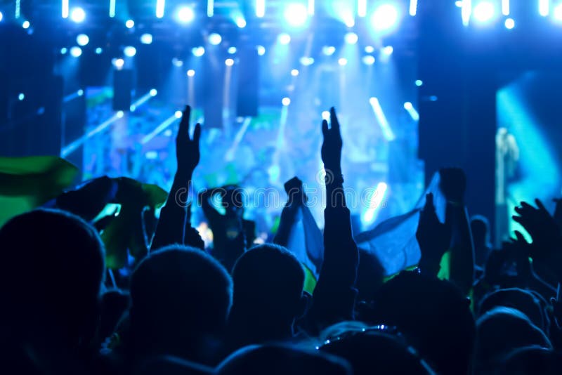 Silhouettes of Human Heads and Hands at a Rock Concert Stock Image ...