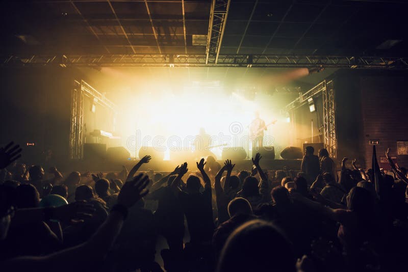 Silhouettes of Concert Crowd in Front of Bright Stage Lights Stock ...