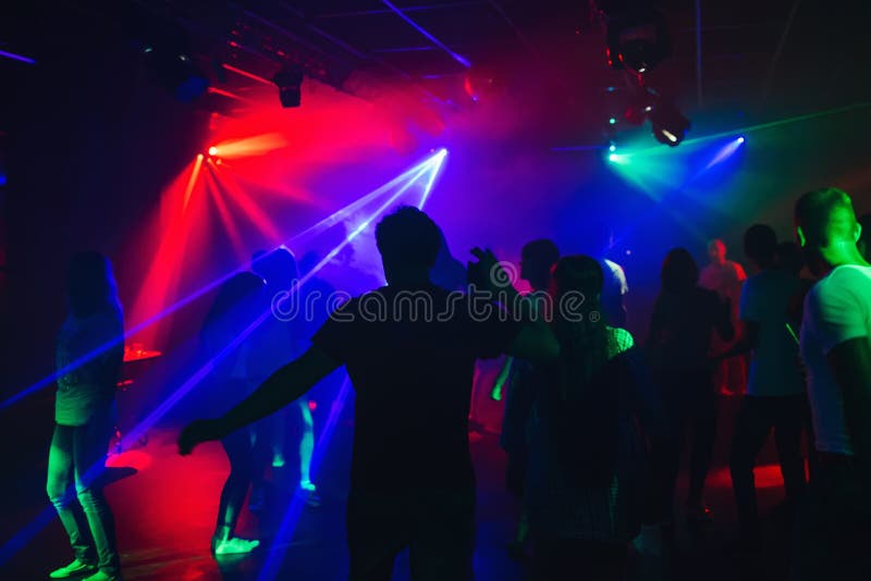 Silhouettes of People Dancing in Nightclub on Dance Floor at Party ...