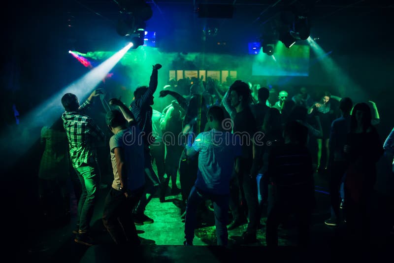 Silhouettes of People Dancing in Nightclub on Dance Floor at Party ...