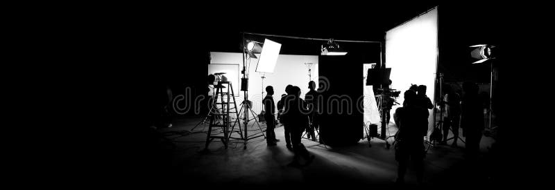 Silhouettez les images de la production visuelle dans les coulisses image libre de droits Silhouettez les images de la production visuelle dans les coulisses image libre de droits