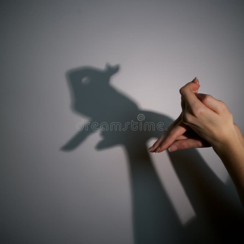 Silhouettieren Sie Schatten des Kaninchens stockfotos Silhouettieren Sie Schatten des Kaninchens stockfotos