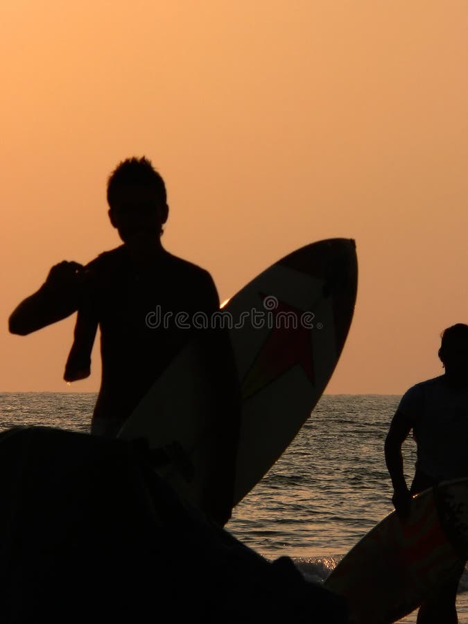 Surfer at sunset. Surfer at sunset