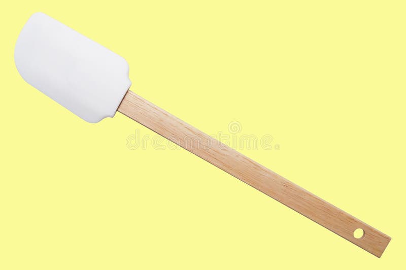 Silicone della spatola della cucina con la maniglia di legno su fondo giallo Isolato fotografie stock libere da diritti Silicone della spatola della cucina con la maniglia di legno su fondo giallo Isolato fotografie stock libere da diritti