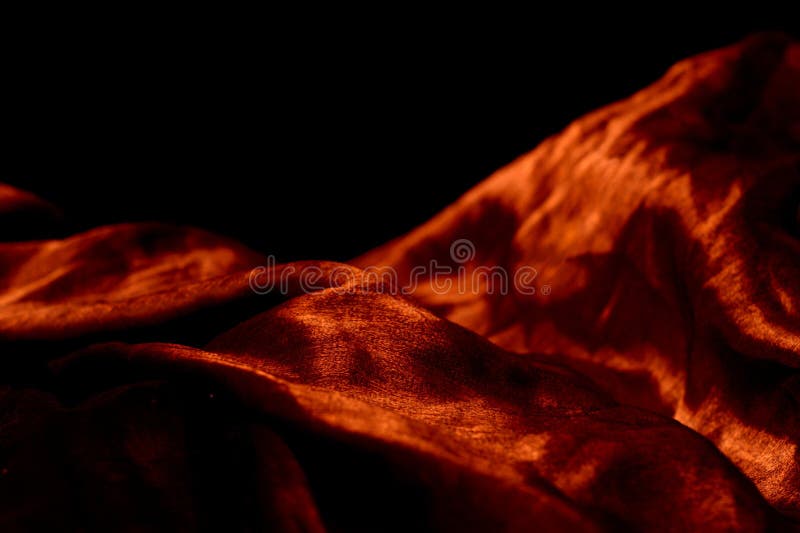 Silky textile on black background royalty free stock images