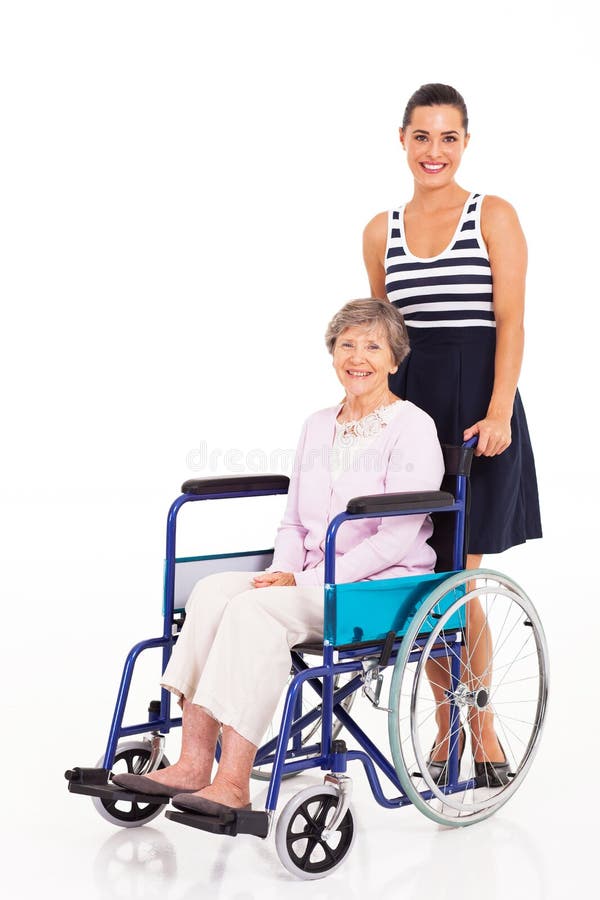 Caring daughter pushing senior mother on wheelchair on white background. Caring daughter pushing senior mother on wheelchair on white background