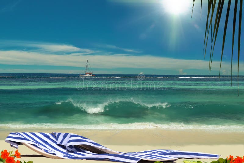 Deck chairs is relaxing on paradise beach. On background there is blue sunshining sky & beautiful sea with the sailing boat. The sky area is free for your text. Deck chairs is relaxing on paradise beach. On background there is blue sunshining sky & beautiful sea with the sailing boat. The sky area is free for your text.