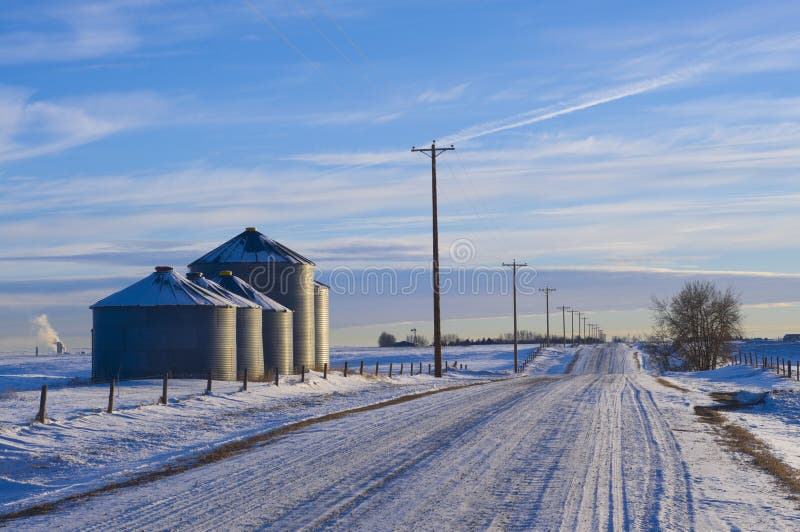 Silo s near country road in winter