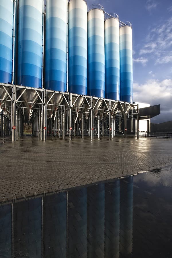 Reflection of silos in water