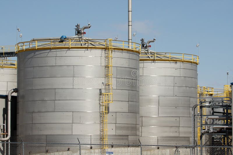 Grain silos or storage bins of ethanol plant in the midwest. Grain silos or storage bins of ethanol plant in the midwest.