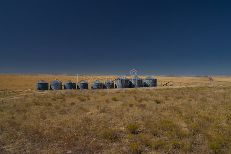 Silos in the middle of a field in the state of Idaho. Silos in the middle of a field in the state of Idaho