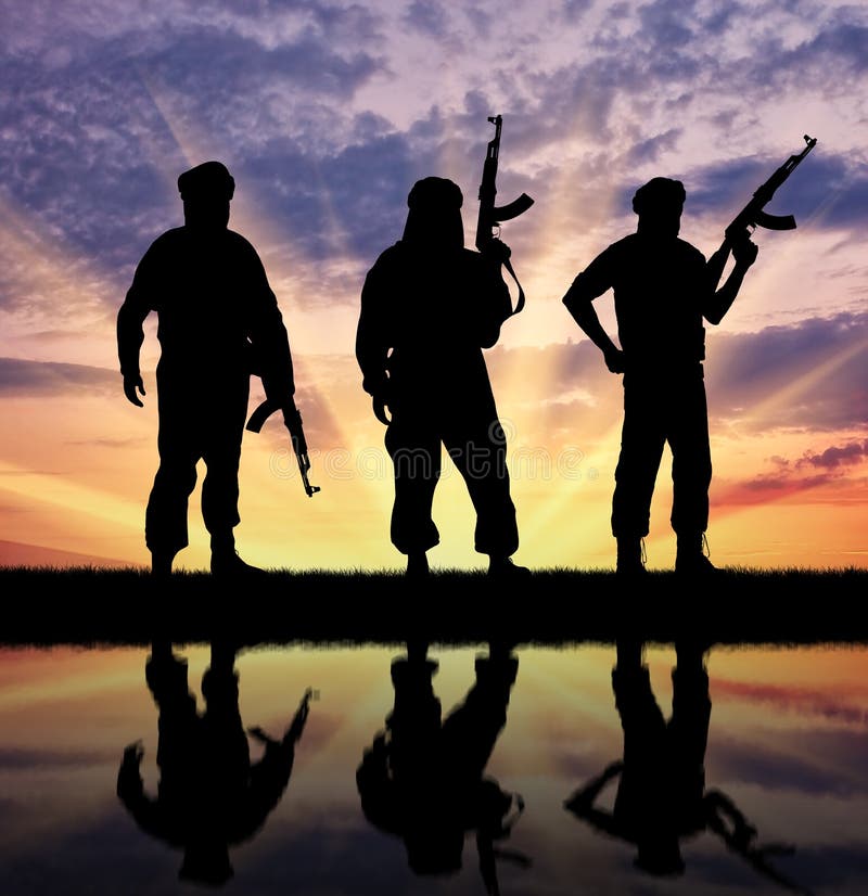 Silueta de tres terroristas imagen de archivo Silueta de tres terroristas imagen de archivo