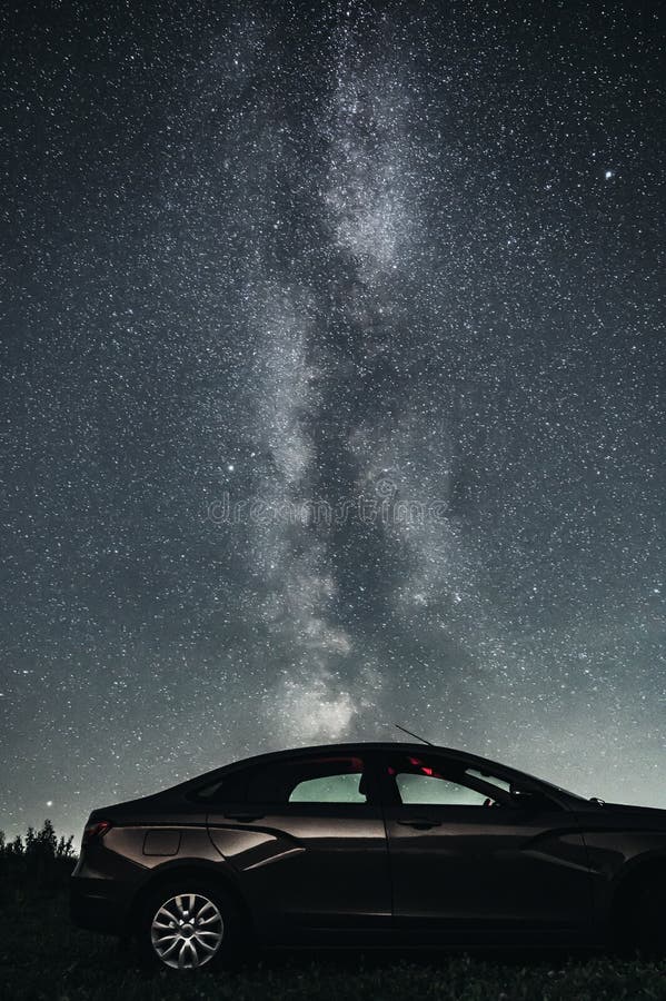 Silhouette of Car under beautiful night sky with stars and amazing Milky way galaxy. Side view. Silhouette of Car under beautiful night sky with stars and amazing Milky way galaxy. Side view