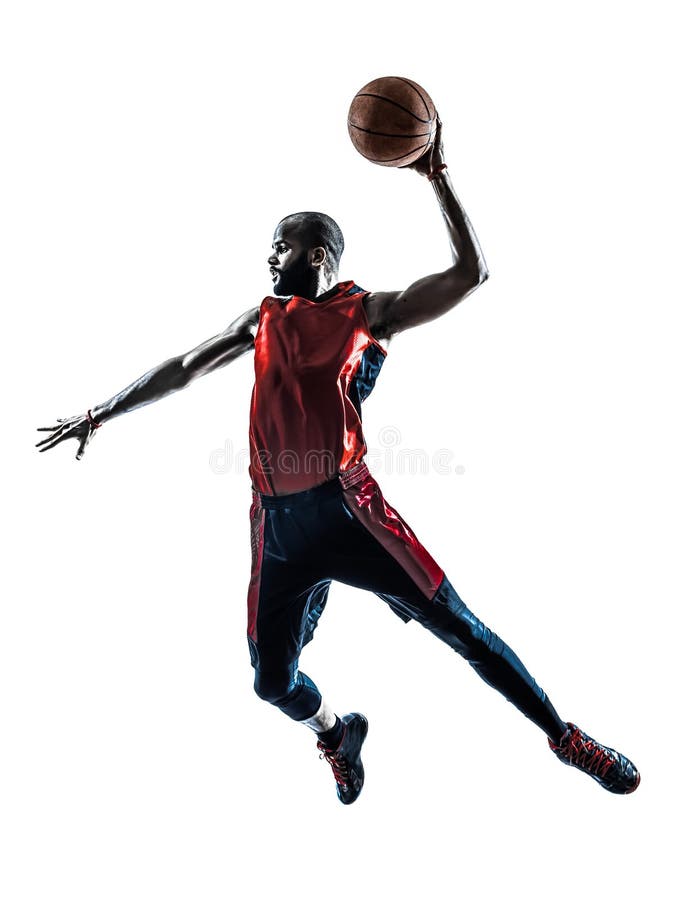Siluetta dunking di salto del giocatore di pallacanestro dell'uomo immagine stock Siluetta dunking di salto del giocatore di pallacanestro dell'uomo immagine stock