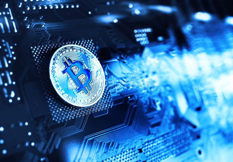 Silver coin bitcoin on a microchip background. royalty free stock photos