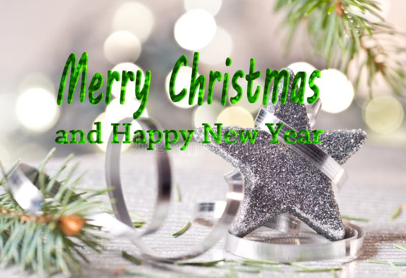 Silver Christmas star with text Merry Christmas stock photo Silver Christmas star with text Merry Christmas stock photo