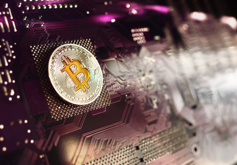 Silver coin bitcoin on a microchip background. royalty free stock image