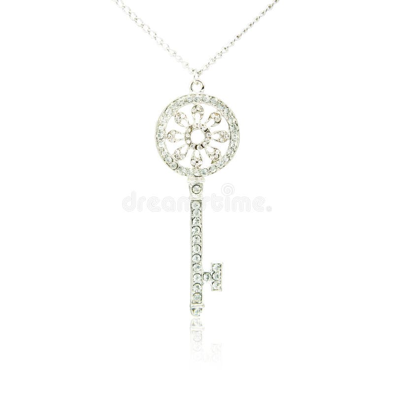 Silver diamond key pendant isolated on white