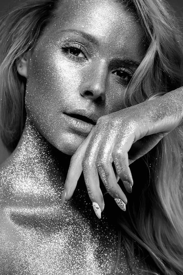 Silver Girl. Beautiful Young Woman with Sparkles royalty free stock photos Silver Girl. Beautiful Young Woman with Sparkles royalty free stock photos